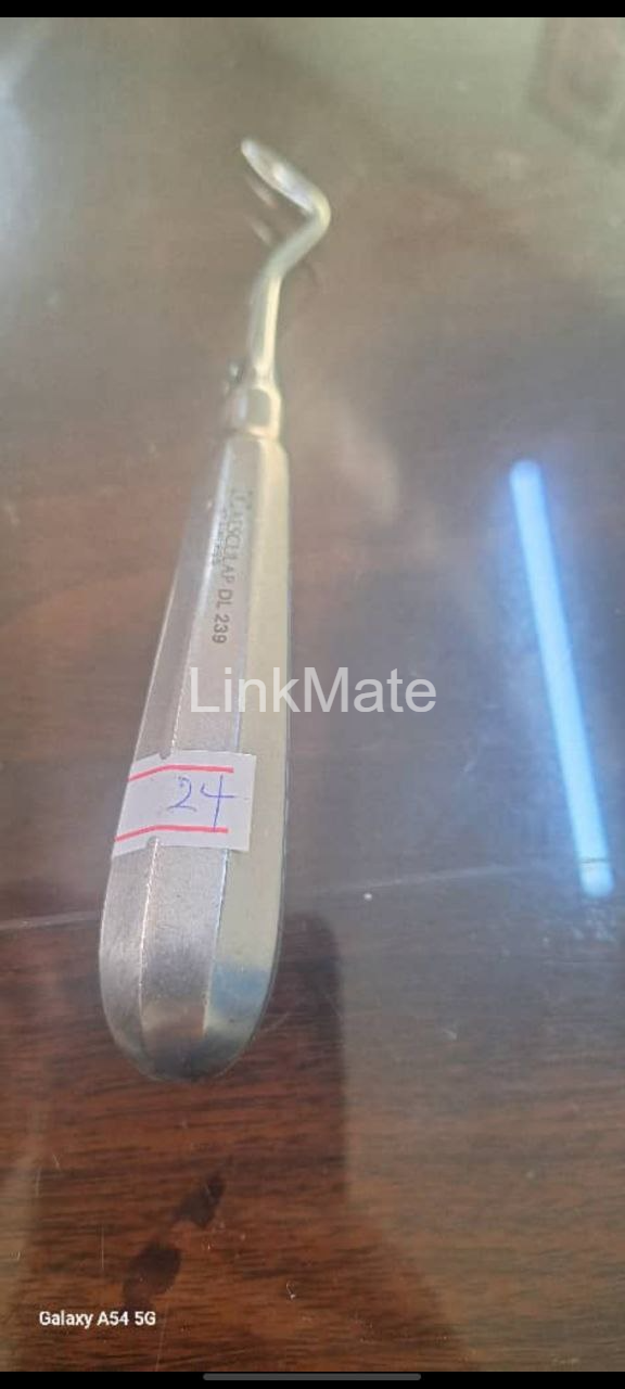 Dental root elevator