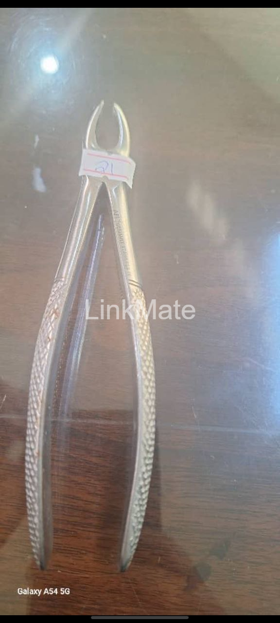 Dental extraction forceps