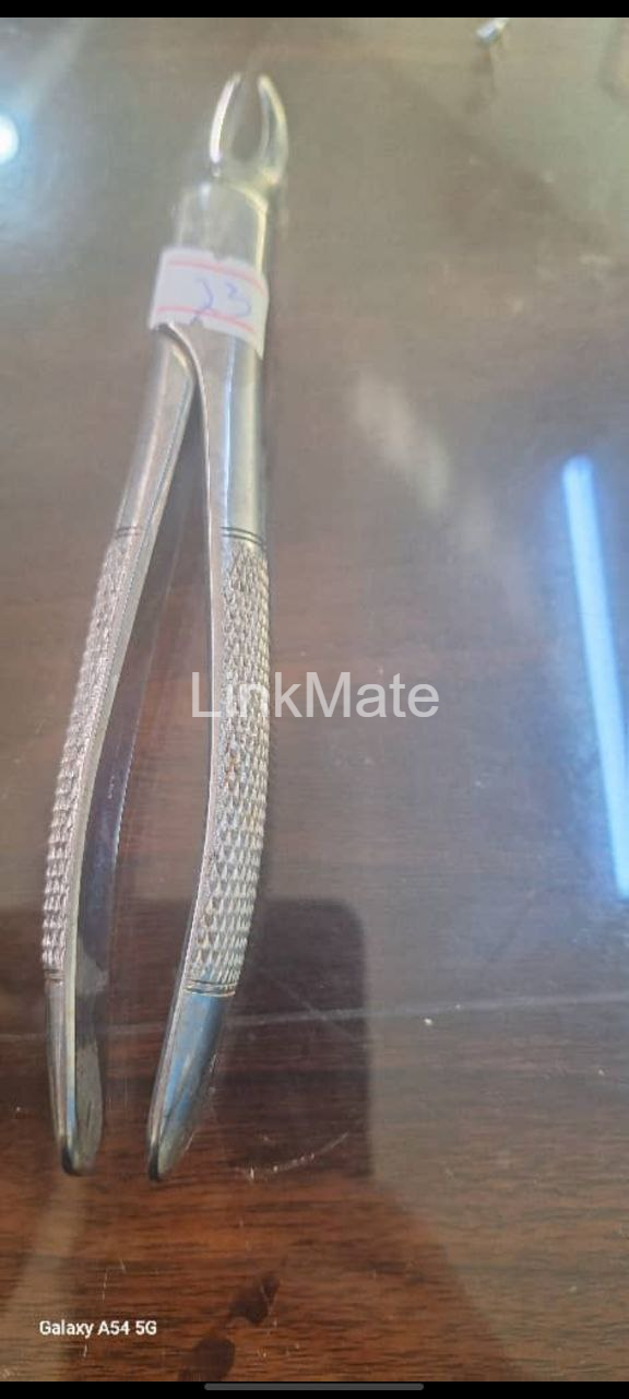 Dental extraction forceps