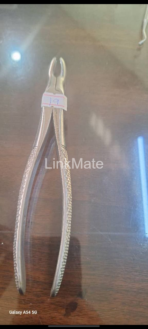 Dental extraction forceps